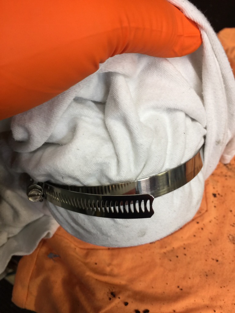 The tee shirt and hose clamp installed