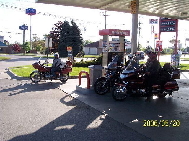 In the US getting gas, minus Bear & Tammy ( Broke Bike ), Glenn & Anne, Frenchy, & Rebel ( Dealing With Customs On T