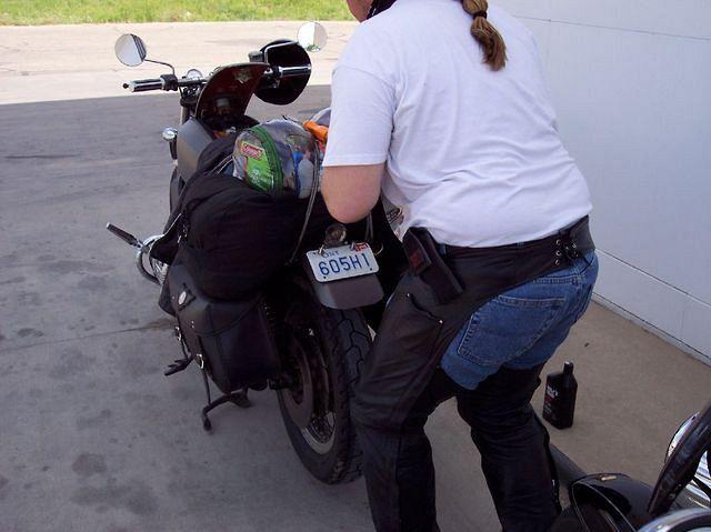 At Beyers, Colo. replacing a tail light blub.