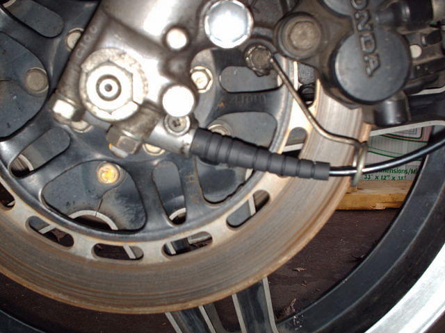Where the speedometer cable connects