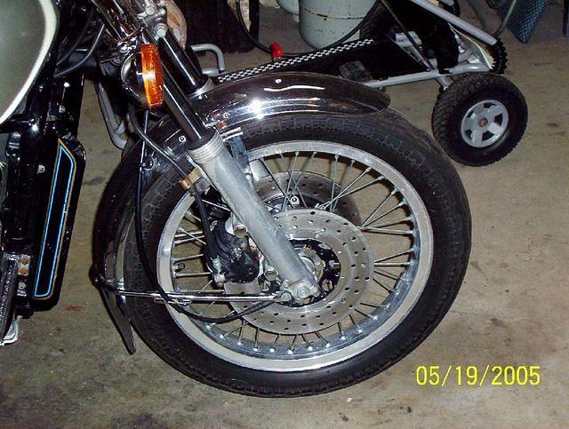 goldwing after washing front, check out the drilled rotors......whoever did it did a good job....and they're surface is like new