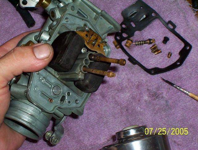 nozzles pushed out from venturi, I used an old model paintbrush with a wooden handle.