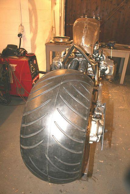 The tank was narrowed to show off those lovely cylinder heads and make the back end look wider ...