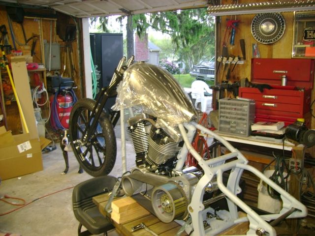 Seeing if this tank's gonna work, too big...rear tire and West Coast Chopper fender is behind us, waiting for the chain...