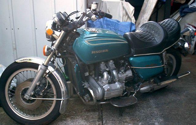 Notice the bungee cord holding on the right side cover, looks like a trip to ebay.