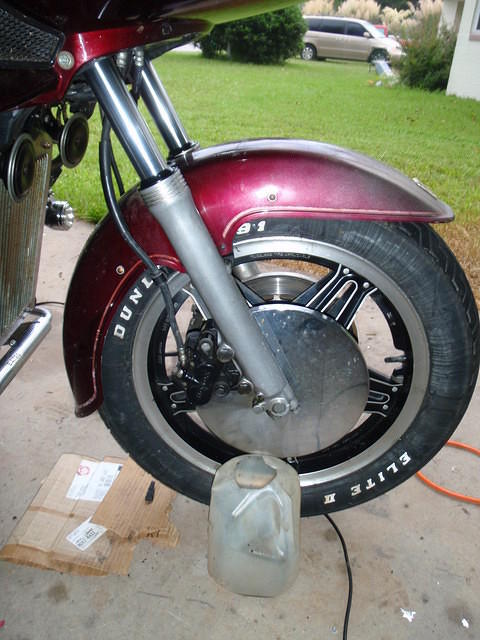 Draining right fork tube...