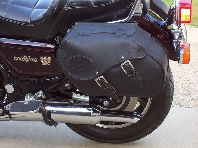 Here's a shot of the sidebags and muffler tips I added.  The bags are from K-Drive and are meant to fit a Road Star. Modified br