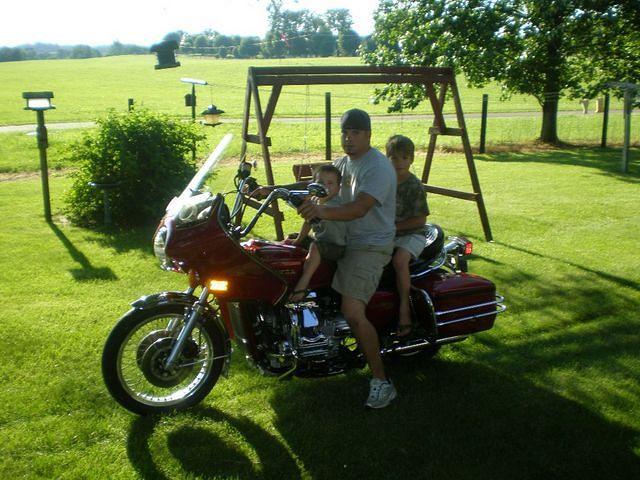 Me and both of my sons takin a lil trip around the yard