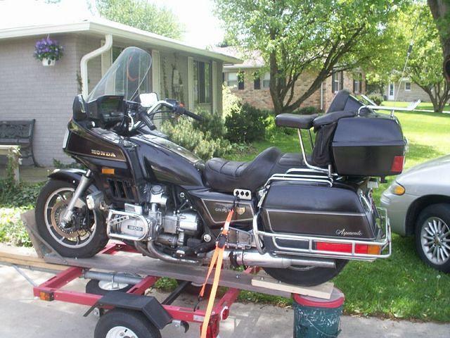 Transporting my 1200 Aspy the day I adopted it ... 

Poor Thang with all those clothes,  Hey ,,, Let's get naked ...