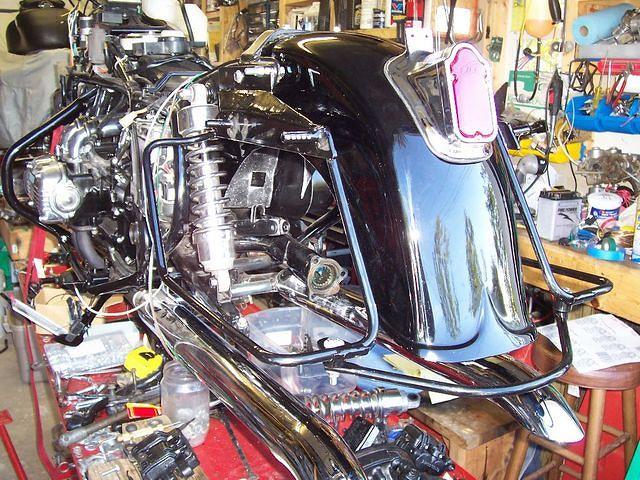 Starting to go back together. The saddle bag rails were powder coated.