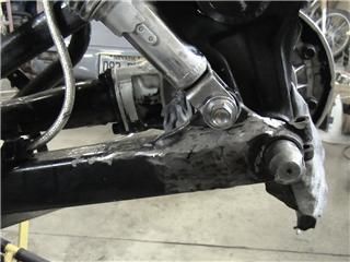 Because of my superior grinding skills it's difficult to tell swingarm has been lengthened about 3/4 inch.