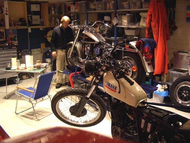 My friend Jonny has his own private garage. He is into HDs, he is working on his Yamaha XT500, old cars; a sixties Ford Cortina,