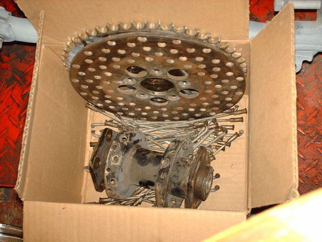 Discarded Harley Parts, Rotor, Chain Drive, Hub, And Spokes