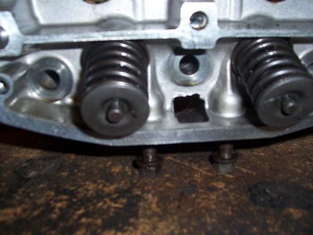 Whats with the casting in this oil passage? The little jagged pieces of aluminum will have to be filled down smooth before the h