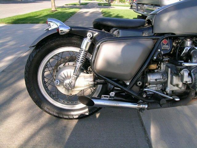 Still have to secure muffler bracket. That paint is 'Hammered' dark grey. Harley Screaming Eagle pipes. Shocks are 11".