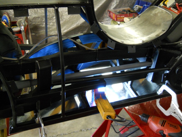 A good shot of our belly pan from back of motor to front of rear wheel- over 40 rivets in it from the bottom!