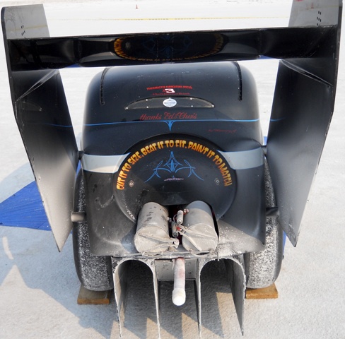 BACK END OF A BAT MOBILE ON THE SALT