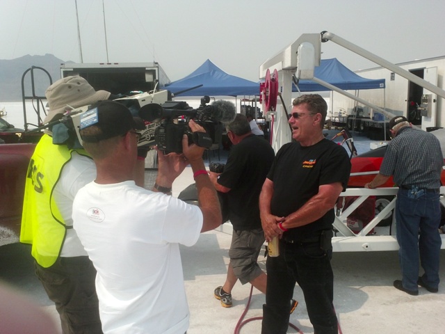 Crew Chief of Speed Demon talking to TV coverage about their failed runs so far but still pulling for a record