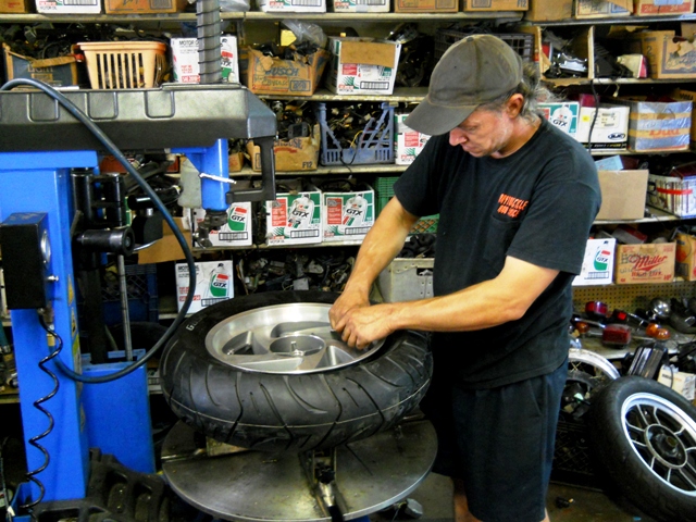MOUNTING THE REAR TIRE AT DAYTONA CYCLE -PLENTY TALL AT 29 AND A HALF INCHS HIGH-WITHOUT AIR-180-70-ZR16