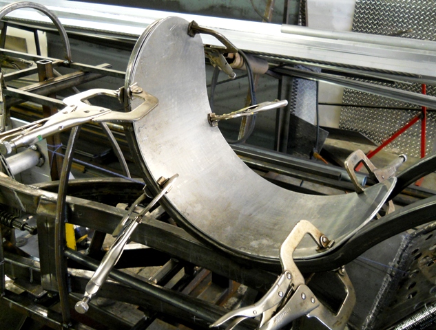 ONE SIZE FITS ALL BUCKET SEAT-WILL HAVE THREE DIFFERENT SIZE CUSTOM MADE PADDED INSERTS FOR DIFFERENT SIZE DRIVERS