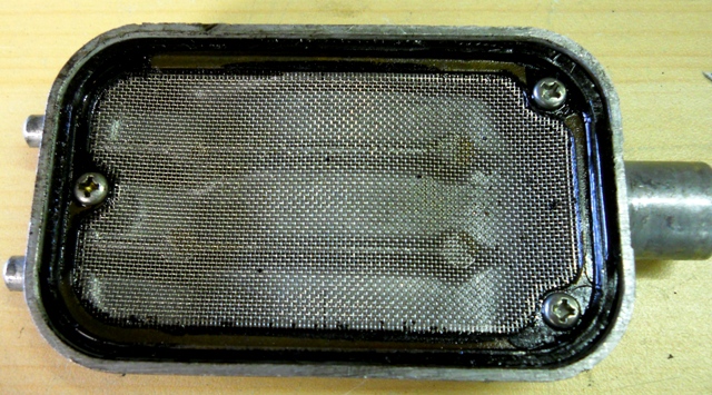UNTOUCHED OIL PUMP STRAINER RIGHT OUT OF THE MOTOR- HOW CLEAN IS THAT