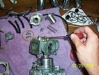 off idle fix jet, buy 4 oem #60 secondary air jets($18), drill out with #62 micro drill bit and pin vise install in place of #11