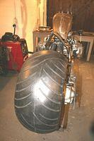 The tank was narrowed to show off those lovely cylinder heads and make the back end look wider ...