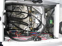 Rev counter (for the shift light) mounted to tank with adhesive backed velcro