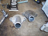 New and old water pump covers