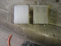 Trimmed about one-sixteenth of an inch off of the end, so the blades insert further