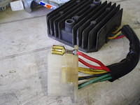  Removing contacts from regulator-rectifier plug to solder, pretty corroded around the crimp