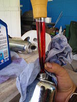 Using a small 16 ml baster to fill the shocks