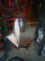 wind screen waiting to go back on