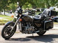 Windshield off the bike, and all of the luggage on. The best way to keep cool on a hot day. 