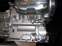 Making sure all areas on engine are coated well