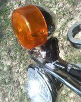 H-D turnsignals mounted on stud with chrome sleeve covering threads.