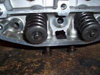 Whats with the casting in this oil passage? The little jagged pieces of aluminum will have to be filled down smooth before the h