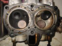 Cylinderhead bottom. See the damage between the cylunders