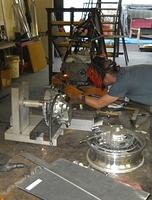 CHRIS FINISHING UP ON TACK WELDS FOR PLATE PLACEMENT.  THE NEW SWING ARM WILL COME OFF THIS PLATE