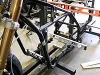 FRAME MUST BE LEVEL AND AT RIGHT HEIGHT FOR REAR WHEEL BEFORE CLAMPING DOWN ZIGS ARE BUILT