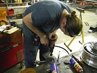 POOR CHRIS GOING THROUGH THREE SNAP ON BATTERY DRILLS TO GET THE WHOLE HALF DRILLED  DANNY MADE OFF WITH THE GOOD DRILL